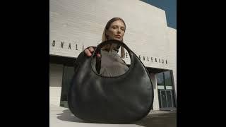 Black Leather Handbag – The Moonstone  Time Resistance Official Video