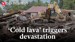 Indonesia Houses submerged in floods after cold lava and mud flows down volcano