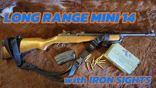 How far can the Mini 14 go with Iron sights and MIL Spec ammo?