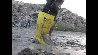 In the mud with yellow crocs boots