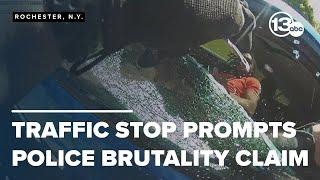 Group claims police brutality after officers smash window pull man from car during traffic stop