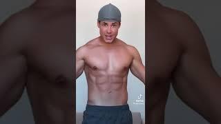 Fit Guy Flexing His Abs Muscle