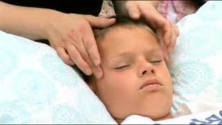 Massaging Face of Child to Treat Sinus Congestion