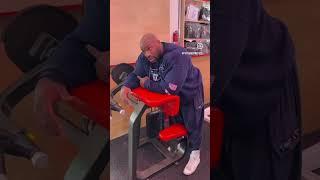 Ron Gordon doing biceps at Psycho’s Body Shop