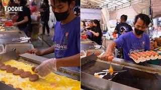 This stall in SINGAPORE cooks up to HUNDREDS of RAMLY BURGER at once So many EGGS