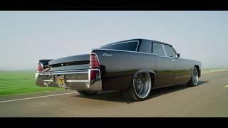 Metalworks black 1965 Lincoln Continental build. Bagged on Rushforth wheels. Suicide slab Lincoln.