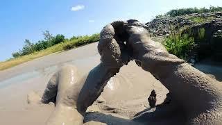 PoV wrists bound in quarry mud