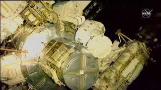 Spacewalkers exit Quest airlock to work on space station upgrades