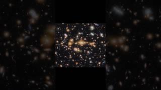The Lensing Galaxy Cluster SPT-CL J0615−5746 A Cosmic Gems Arc #shorts