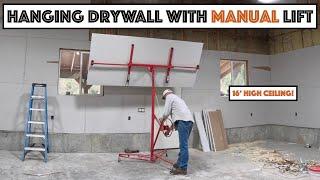 Hanging Drywall In The Shop... Very High Ceilings And A Manual Lift