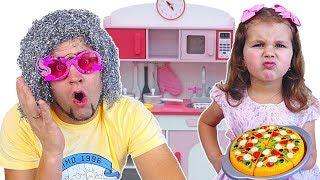 Milana pretend play with kitchen toys