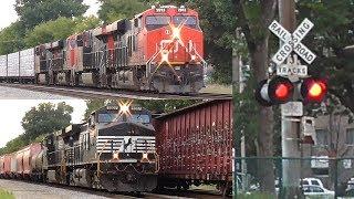 Epic race of CN & NS long mixed freight trains + railroad crossing in Elmwood Park Il