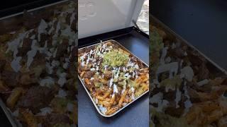 Carne asada fries on the @LoCoCookers griddle