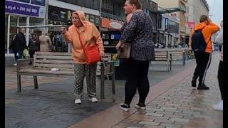 An Argument Over Bird Shit on Argyle Street in Glasgow Outside Marks and Spencer