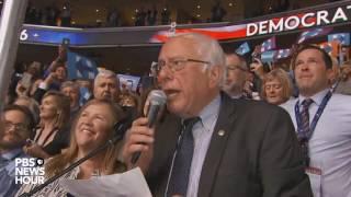 Bernie Sanders surprises crowd moves to nominate Clinton by voice vote at the 2016 DNC