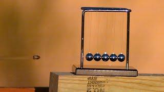 Bullet vs Newtons Cradle at 100000 FPS - The Slow Mo Guys