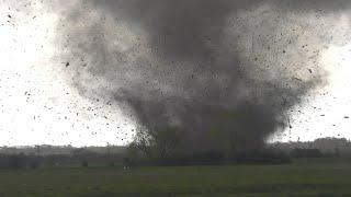 Roaring tornado impacts building and a freight train before crossing I-80 at Waverly Nebraska