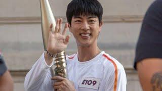 240714 Jin 김석진 of BTS carries the flame at the Olympic Torch Relay in Paris  1st Torchbearer 