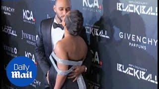 Pregnant Alicia Keys receives a kiss from Swizz Beatz archive - Daily Mail