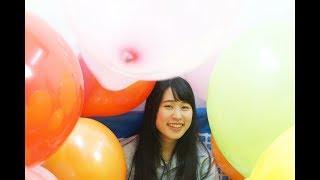 A Japanese idol plays with 100 balloons in the pool