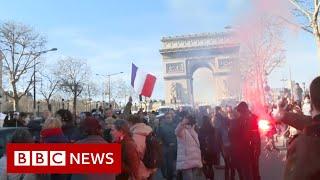 Tens of thousands protest against Covid pass in France - BBC News