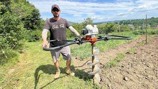 Making some holes with Stihl BT 360 earth auger. Foreza de pamant cu burghiu de 250 mm in diametru