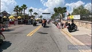 2023 Daytona Bike Week. Guy drops Harley with wife on it