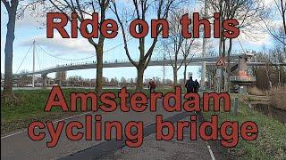 A ride on a huge cycling bridge in Amsterdam