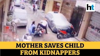 Watch Mother fights off kidnappers saves 4-yr-old child in Delhi