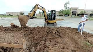 ADA sidewalk . Grading the ground before pouring concrete to meet ADA handicap specs.