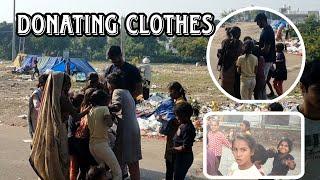 Bacho me Ladai karvaadi  Donating Clothes