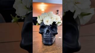 Skull centerpiece using candy jar and some roses #halloweendiy #halloweendecor  #diydiadelosmuertos