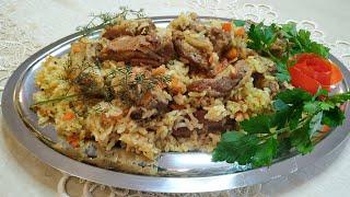 Plov Delizioso.   Piatto di riso con carne