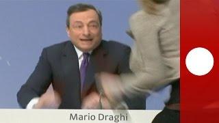Protester attacks ECB cheif Mario Draghi during news conference
