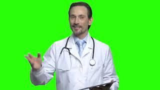 handsome friendly male doctor with tablet portrait of positive doctor talking green screen