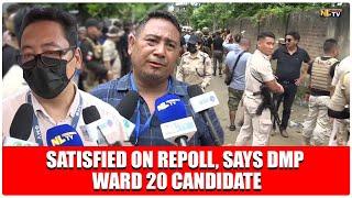 SATISFIED ON REPOLL SAYS DMP WARD 20 CANDIDATE.