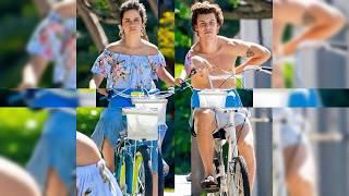 Camila cabello and Shawn mendes riding a bike in miami 