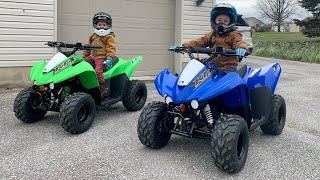 Our Kids get a HUGE SURPRISE New Kawasaki KFX50 Four-Wheelers for Christmas