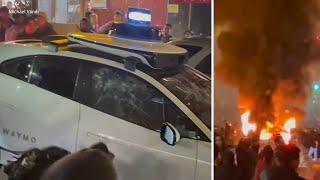 Waymo incident Video shows self-driving car vandalized and set on fire in San Franciscos Chinatown