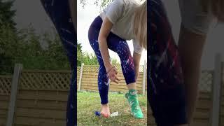 girl barefoot crushing bottle  girl stepping