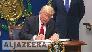 Donald Trump defends immigration ban