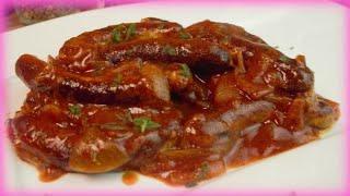 Fried sausage with onion sauce simply made quickly and deliciously bratwurst with sauce