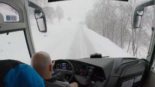 Bus drive in the Alps snow season  4K