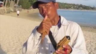 Thai  wodeflute wind instrument played on beach