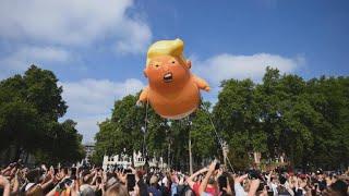 Trump baby balloon takes flight as protesters converge in London