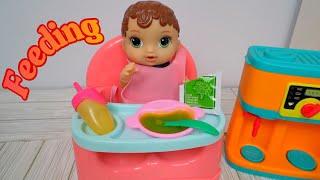 Feeding Baby Alive Abby a doll food packet