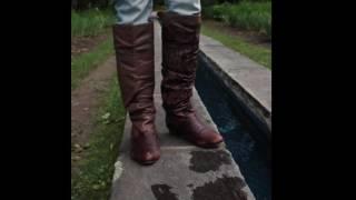 Brown Leather Boots Going Deep in Water