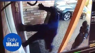 CCTV captures moment masked gang boot down door to steal Porsche