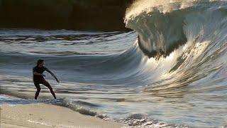 RAW - Skimboarders and Surfers Enjoy Incredible Fall Wave Conditions During California Wild Fires