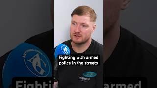 Fighting with armed police in the streets